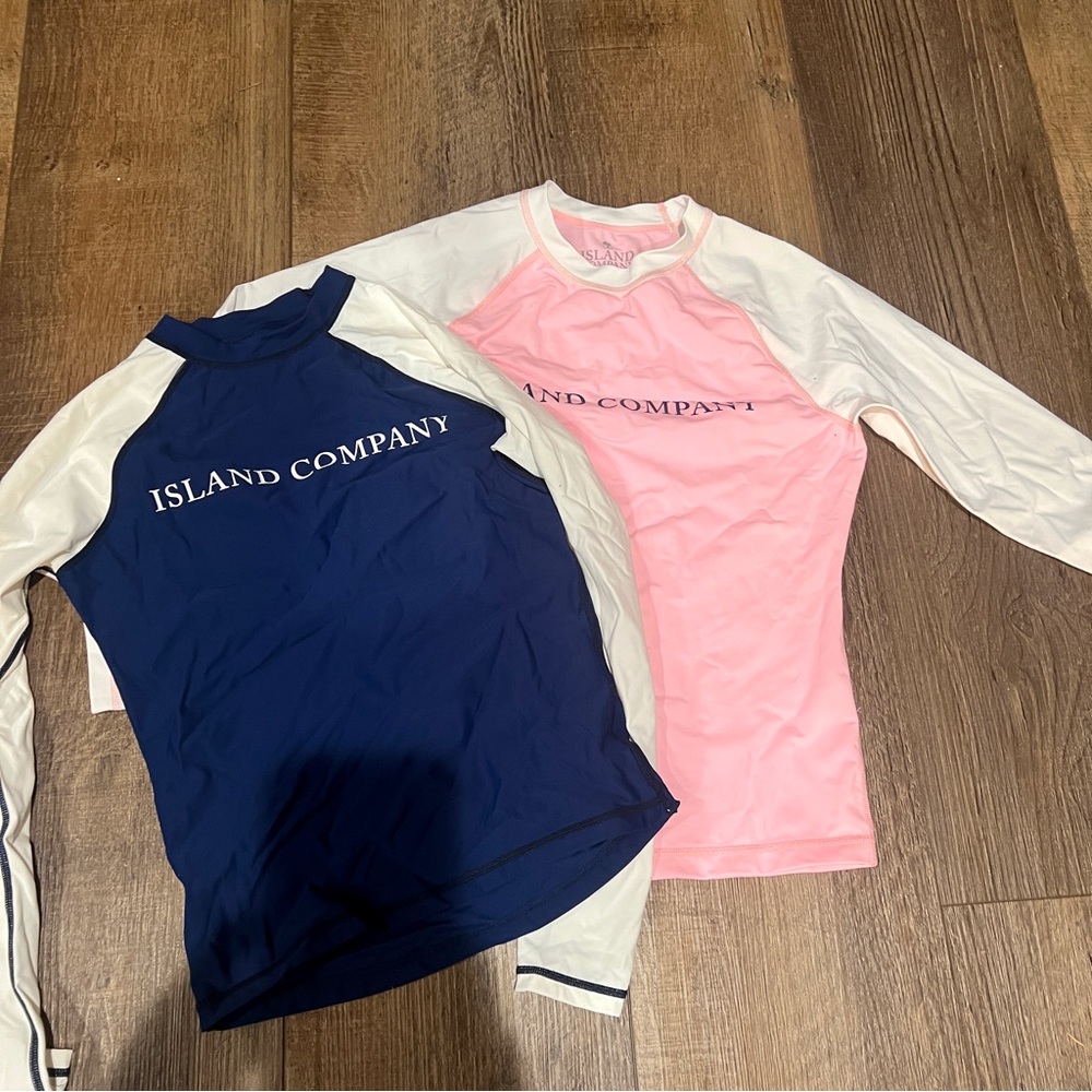 2 island company rash guards. One size S and one size XS